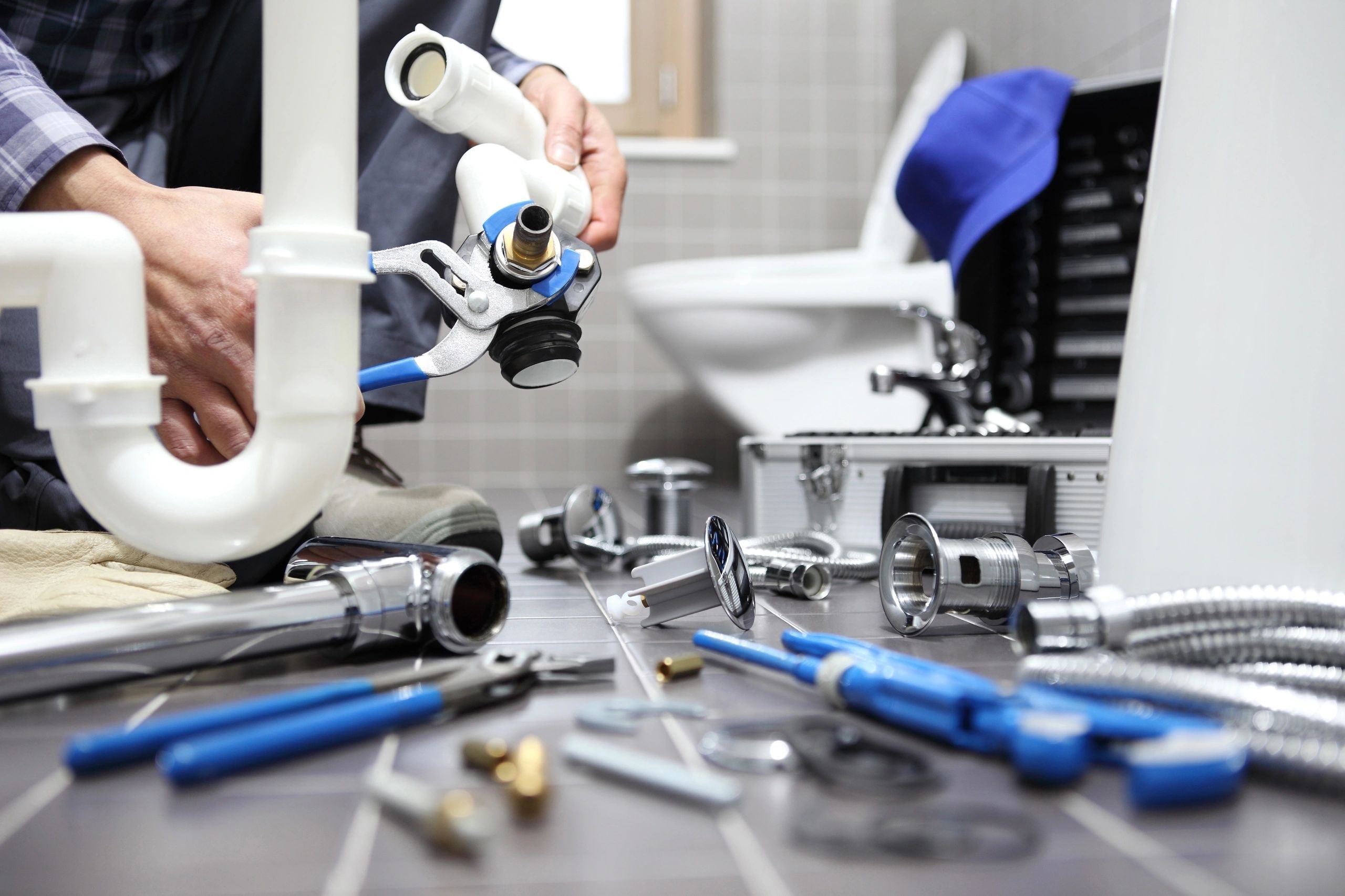 Plumbing technician at work